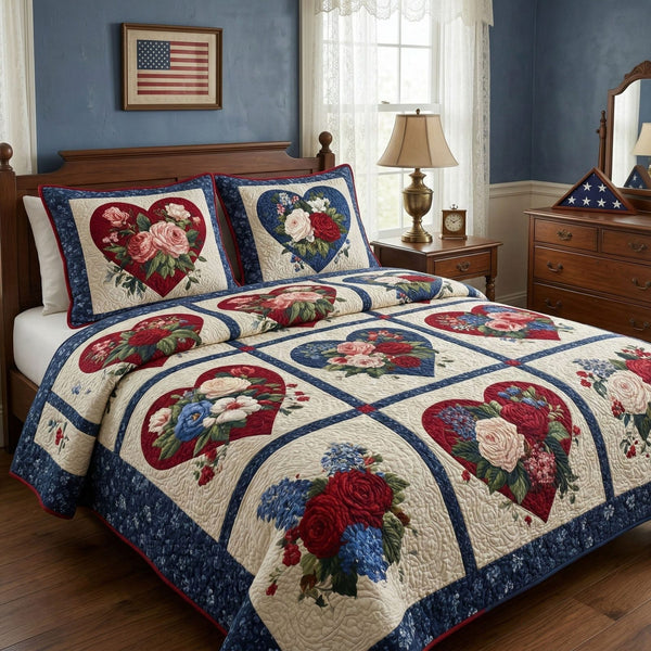 Liberty Heart Garden quilted 3-piece bedding set on a made bed in a warmly lit bedroom