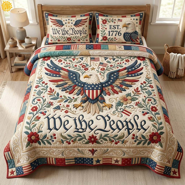 Liberty Heritage quilted 3-piece bedding set on a made bed in a warmly lit bedroom