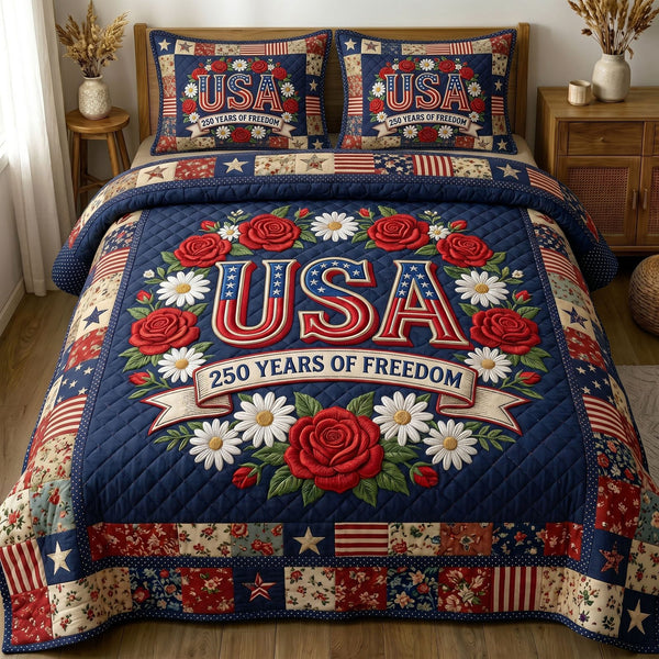 Liberty Legacy quilted 3-piece bedding set on a made bed in a warmly lit bedroom