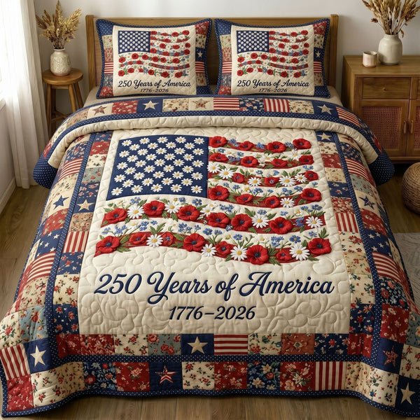 Liberty Legacy quilted 3-piece bedding set on a made bed in a warmly lit bedroom