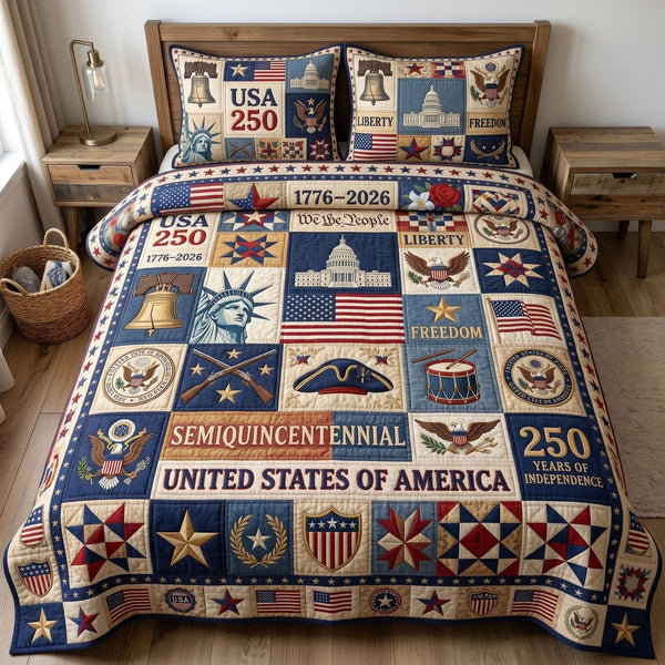 Liberty Legacy quilted 3-piece bedding set on a made bed in a warmly lit bedroom