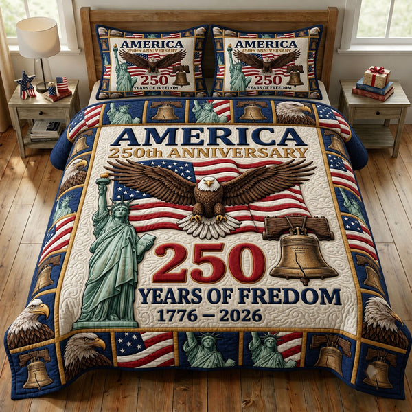 Liberty Legacy quilted 3-piece bedding set on a made bed in a warmly lit bedroom