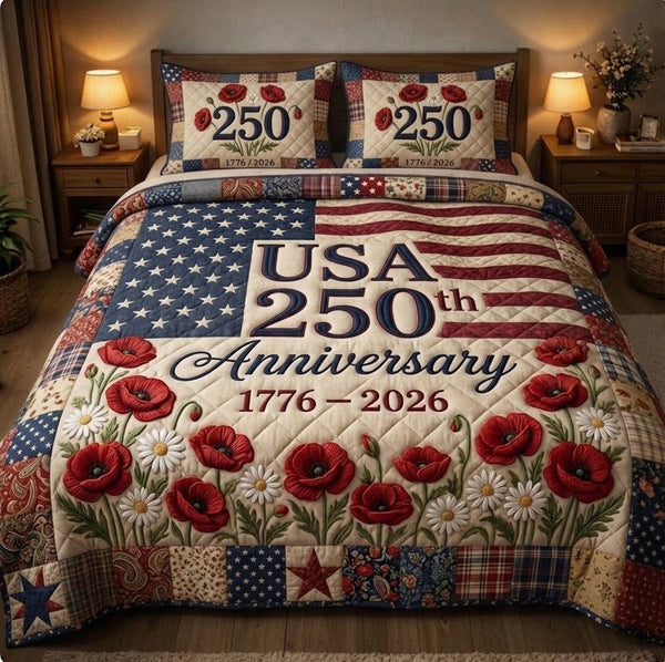 Liberty Legacy quilted 3-piece bedding set on a made bed in a warmly lit bedroom