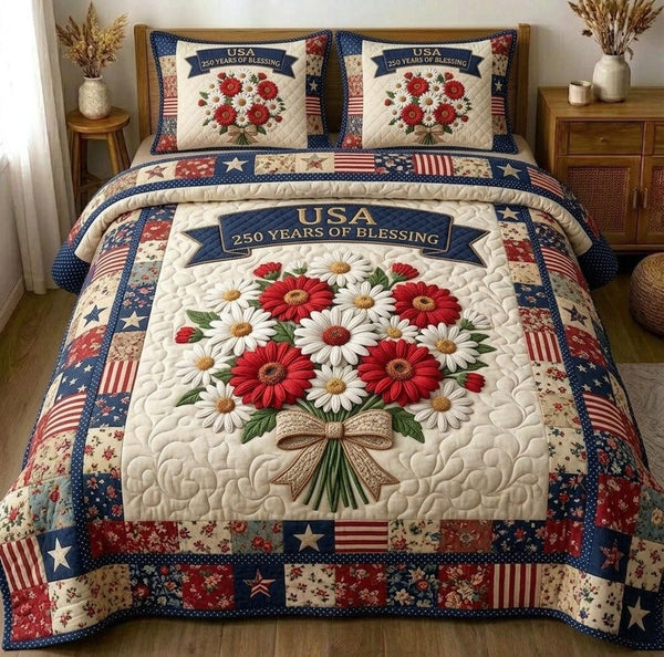Liberty Legacy quilted 3-piece bedding set on a made bed in a warmly lit bedroom