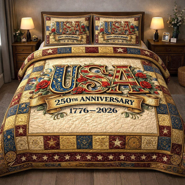 Liberty Legacy quilted 3-piece bedding set on a made bed in a warmly lit bedroom