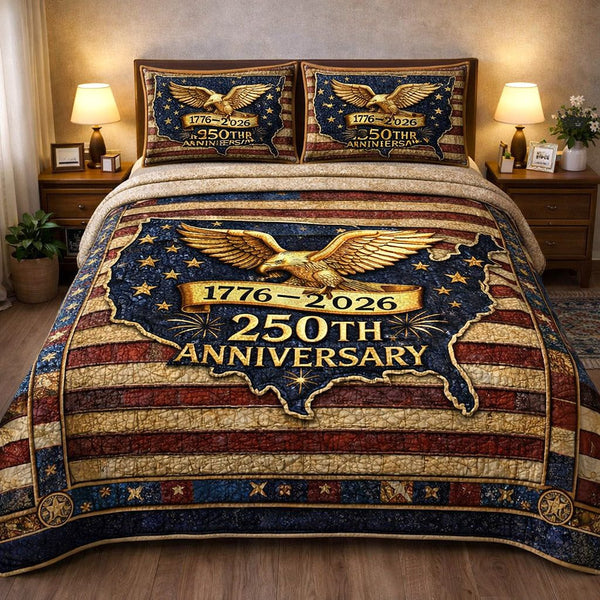 Liberty Legacy quilted 3-piece bedding set on a made bed in a warmly lit bedroom