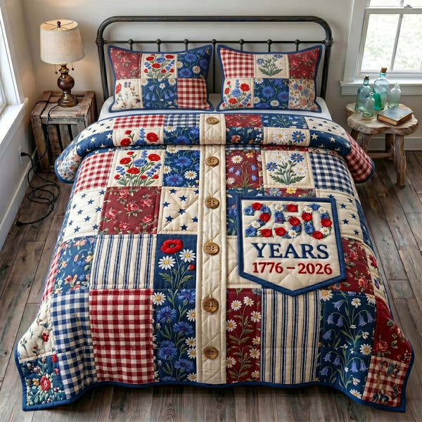 Liberty Legacy quilted 3-piece bedding set on a made bed in a warmly lit bedroom