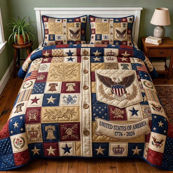 Liberty Legacy quilted 3-piece bedding set on a made bed in a warmly lit bedroom