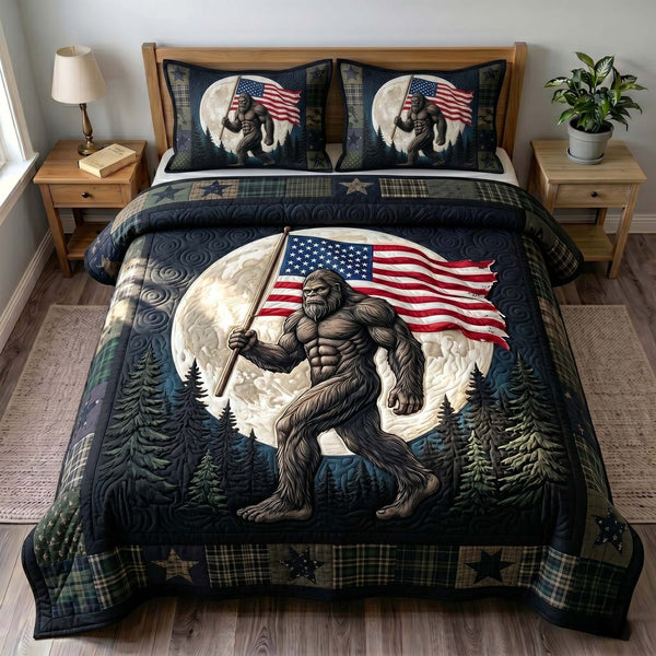 Liberty Legend quilted 3-piece bedding set on a made bed in a warmly lit bedroom