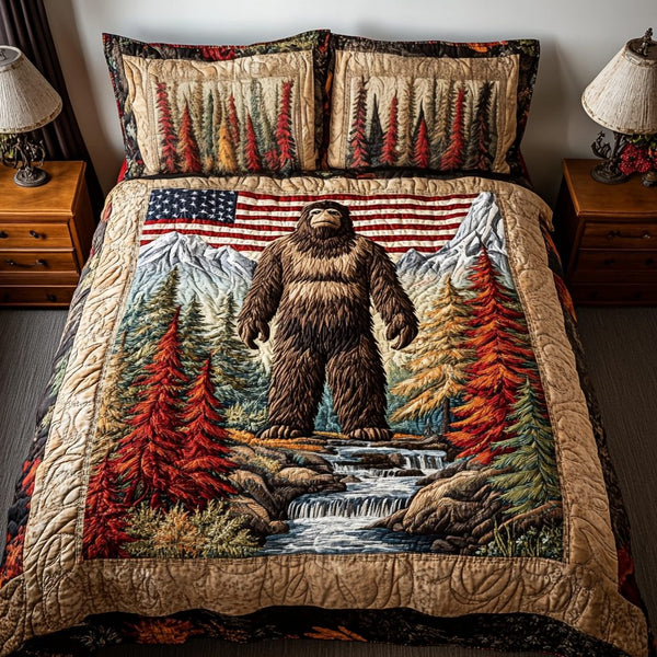 Liberty Legend quilted 3-piece bedding set on a made bed in a warmly lit bedroom