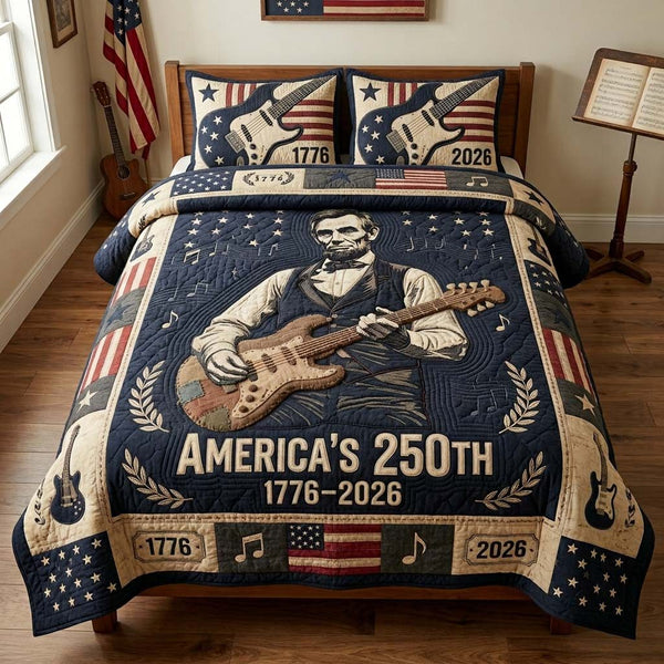 Liberty Rock quilted 3-piece bedding set on a made bed in a warmly lit bedroom