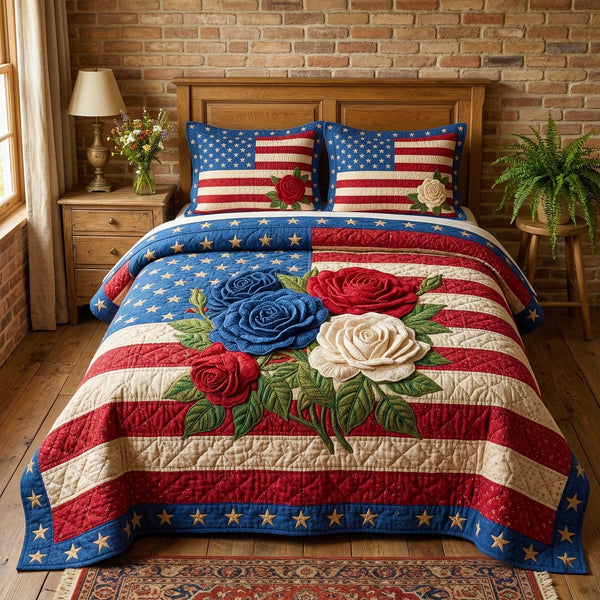 Liberty Roses quilted 3-piece bedding set on a made bed in a warmly lit bedroom