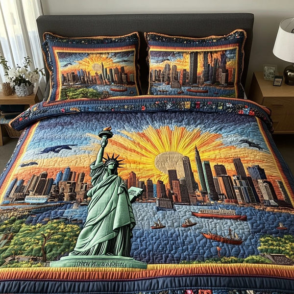 Liberty Spirit quilted 3-piece bedding set on a made bed in a warmly lit bedroom