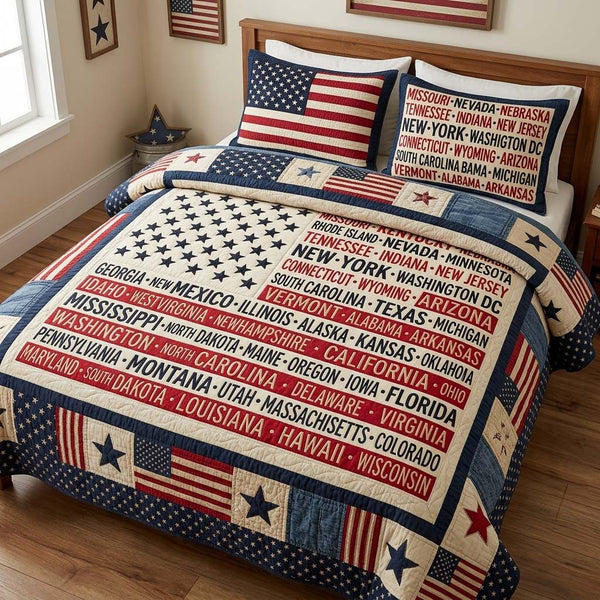 Liberty States quilted 3-piece bedding set on a made bed in a warmly lit bedroom