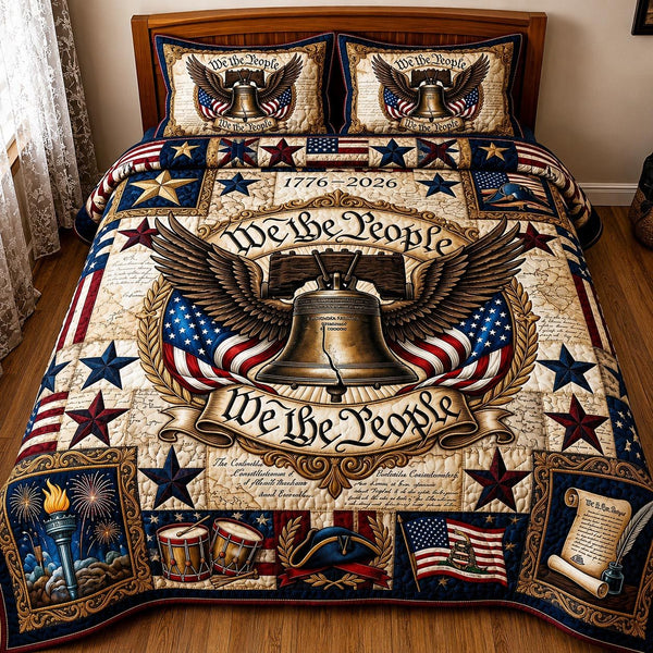 Liberty Threads quilted 3-piece bedding set on a made bed in a warmly lit bedroom