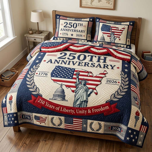 Liberty Unity quilted 3-piece bedding set on a made bed in a warmly lit bedroom