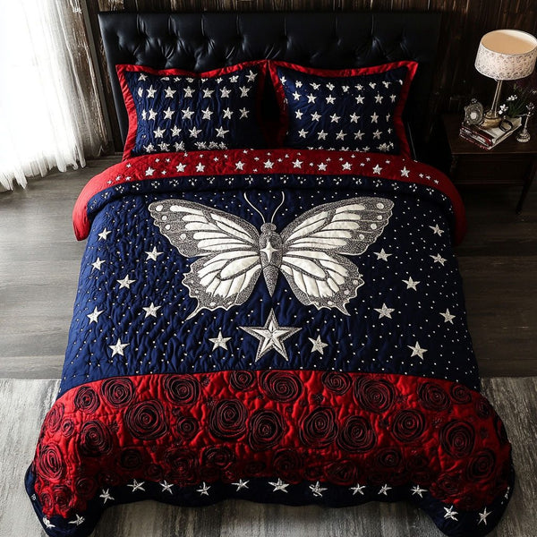 Liberty Wings quilted 3-piece bedding set on a made bed in a warmly lit bedroom