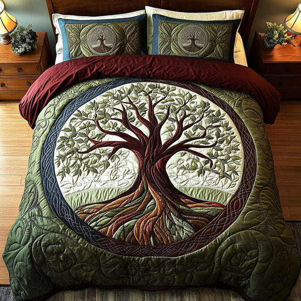 Life Roots quilted 3-piece bedding set on a made bed with two matching pillow shams