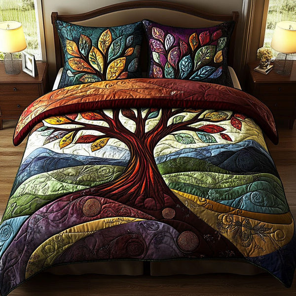 Life Tapestry quilted 3-piece bedding set on a made bed with two matching pillow shams