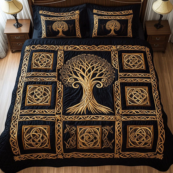 Lifes Canopy quilted 3-piece bedding set on a made bed with two matching pillow shams