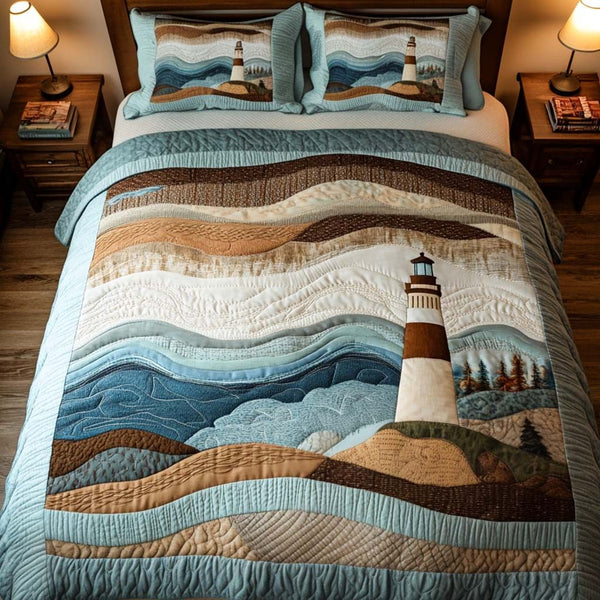 Lighthouse Dreams quilted 3-piece bedding set on a made bed in a light coastal bedroom