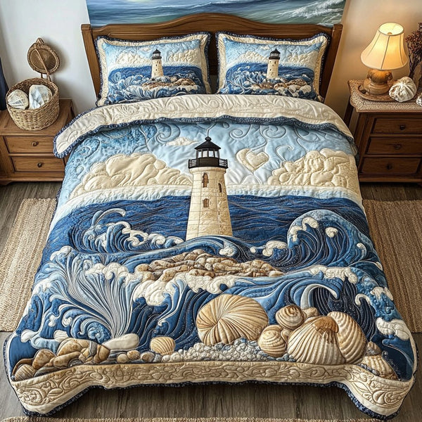 Lighthouse Dreams quilted 3-piece bedding set on a made bed in a light coastal bedroom