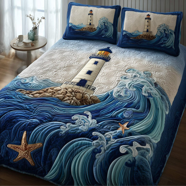 Lighthouse quilted 3-piece bedding set on a made bed in a light coastal bedroom
