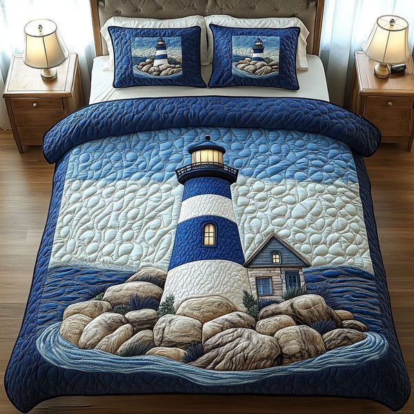 Lighthouse Retreat quilted 3-piece bedding set on a made bed in a light coastal bedroom