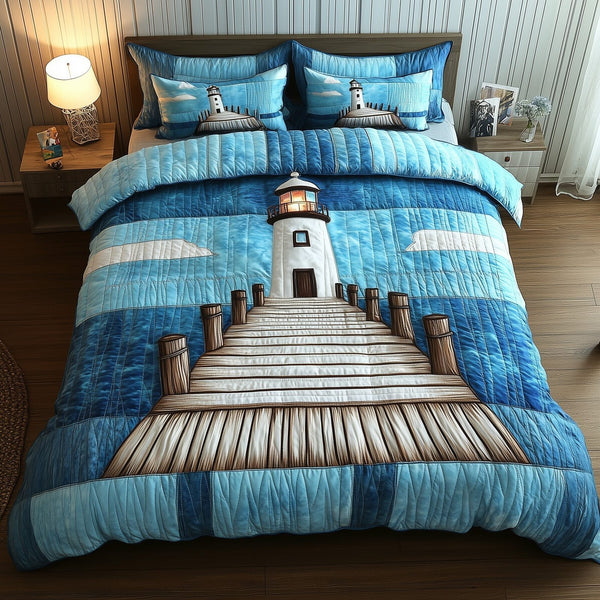 Lighthouse Serenity quilted 3-piece bedding set on a made bed in a light coastal bedroom