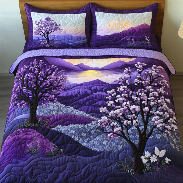 Lilac Haven quilted 3-piece bedding set on a made bed with two matching pillow shams