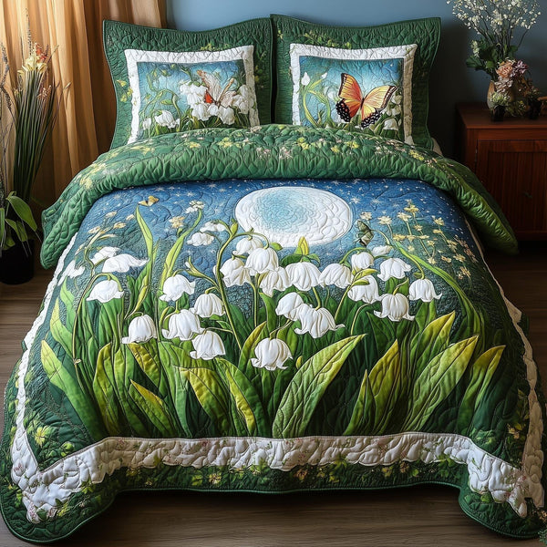 Lily Butterfly quilted 3-piece bedding set on a made bed with two matching pillow shams
