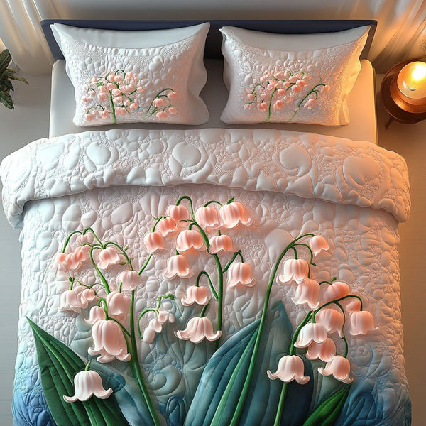 Lily Dreamscape quilted 3-piece bedding set on a made bed with two matching pillow shams