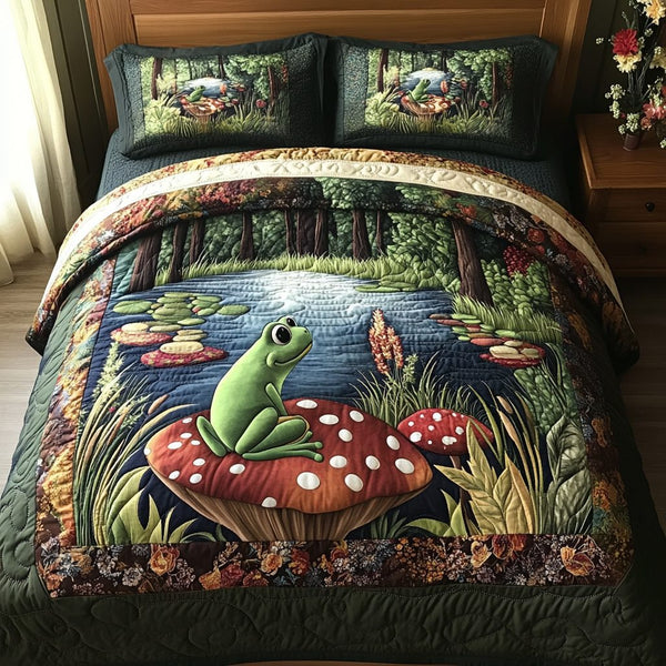 Lily Luxe quilted 3-piece bedding set on a made bed with two matching pillow shams