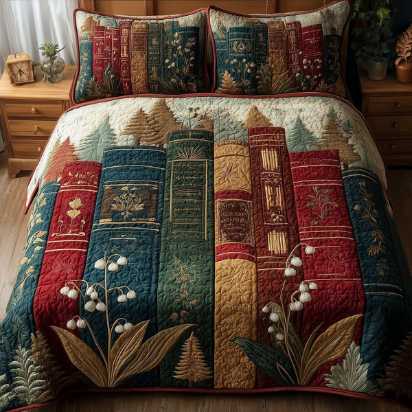 Lily Of The Valley Bookworm quilted 3-piece bedding set on a made bed with two matching pillow shams