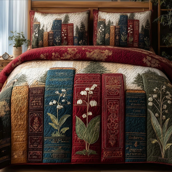 Lily Of The Valley Bookworm quilted 3-piece bedding set on a made bed with two matching pillow shams
