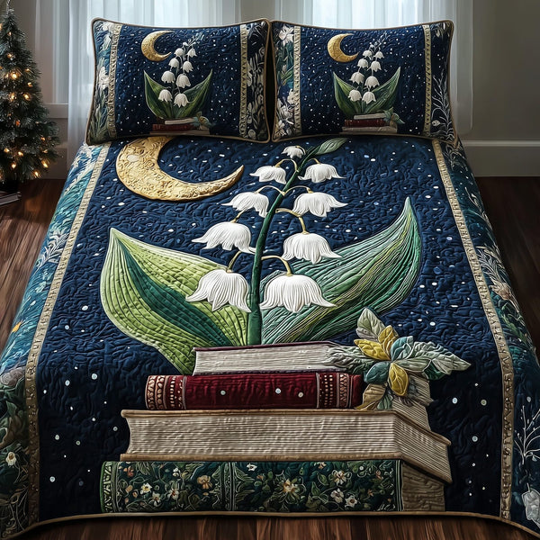 Lily of the Valley Library quilted 3-piece bedding set on a made bed with two matching pillow shams