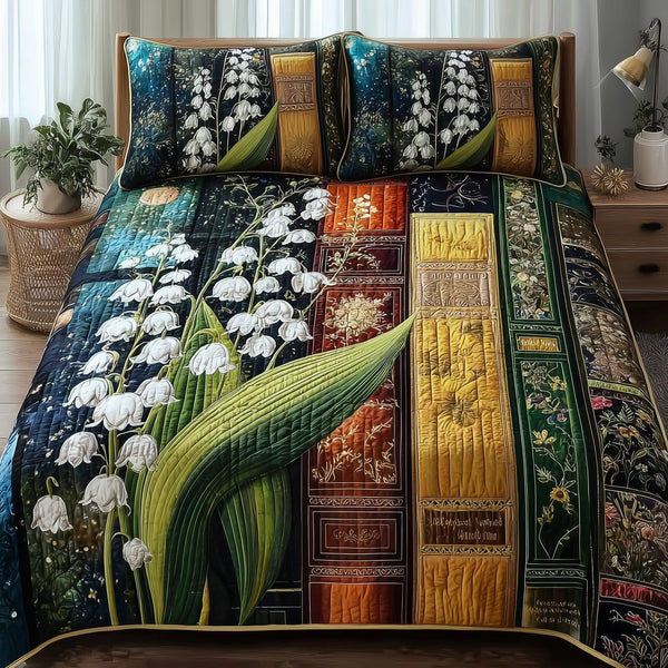 Lily of the Valley Library quilted 3-piece bedding set on a made bed with two matching pillow shams