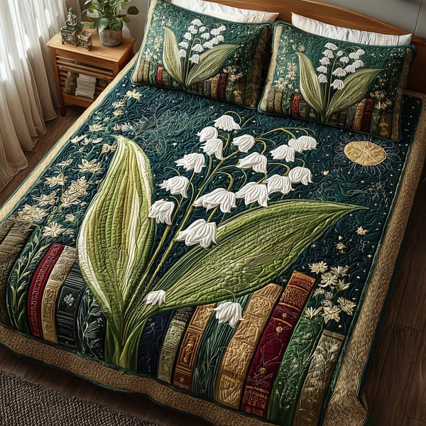 Lily of the Valley Library quilted 3-piece bedding set on a made bed with two matching pillow shams