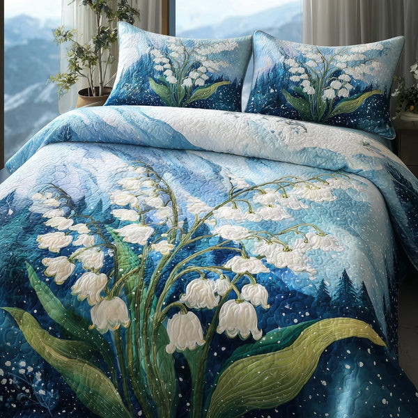 Lily of The Valley quilted 3-piece bedding set on a made bed with two matching pillow shams
