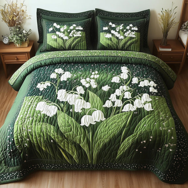 Lily Of The Valley Vibe quilted 3-piece bedding set on a made bed with two matching pillow shams