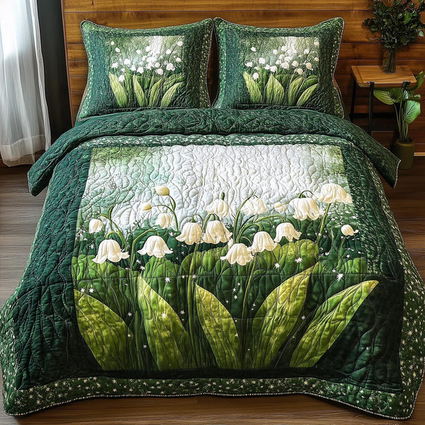 Lily Of The Valley Vibe quilted 3-piece bedding set on a made bed with two matching pillow shams