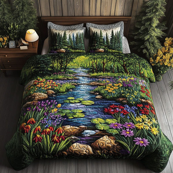 Lily Pond Bliss quilted 3-piece bedding set on a made bed with two matching pillow shams