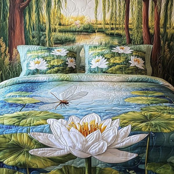Lily Pond Dream quilted 3-piece bedding set on a made bed with two matching pillow shams