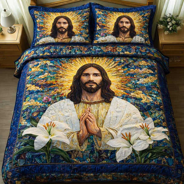 Lily Prayer quilted 3-piece bedding set on a made bed in a softly lit bedroom