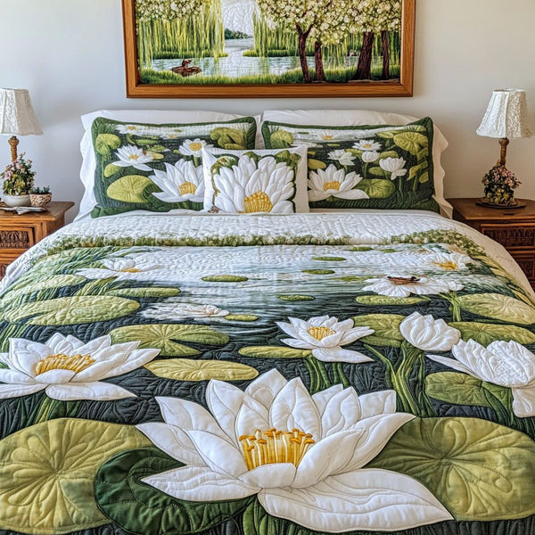 Lily Reflection quilted 3-piece bedding set on a made bed with two matching pillow shams