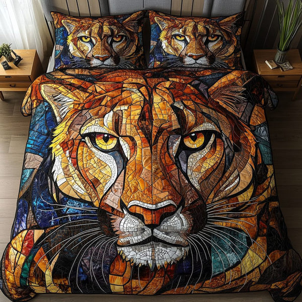 Lioness in Bloom quilted 3-piece bedding set on a made bed with two matching pillow shams