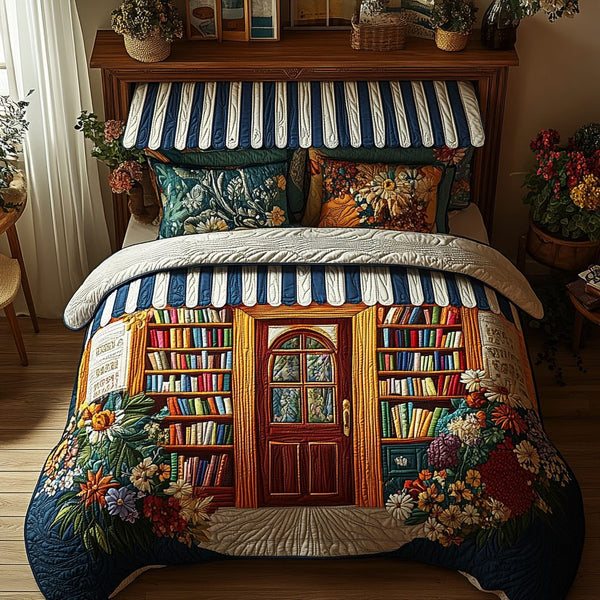 Literary Dreams quilted 3-piece bedding set on a made bed with two matching pillow shams