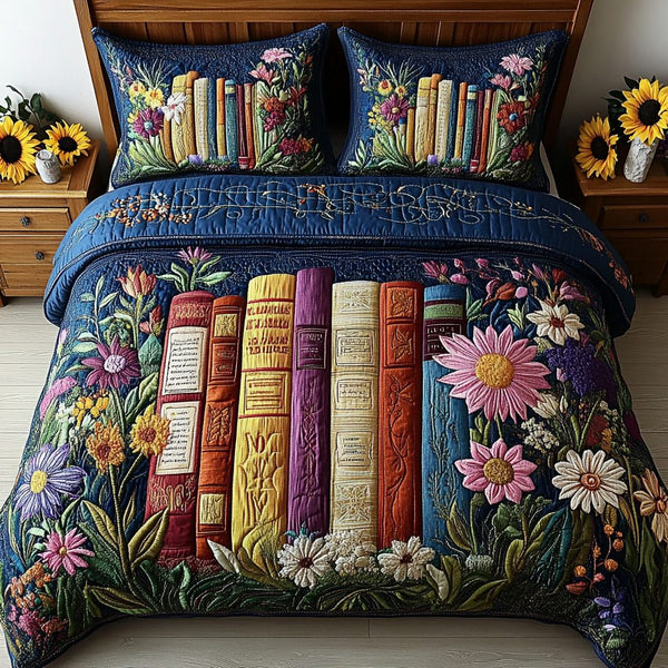 Literary Dreams quilted 3-piece bedding set on a made bed with two matching pillow shams