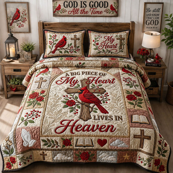 Live In Heaven quilted 3-piece bedding set on a made bed in a softly lit bedroom