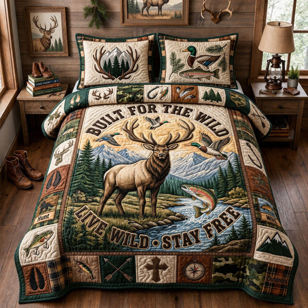 Live Wild Stay Free quilted 3-piece bedding set on a made bed with two matching pillow shams